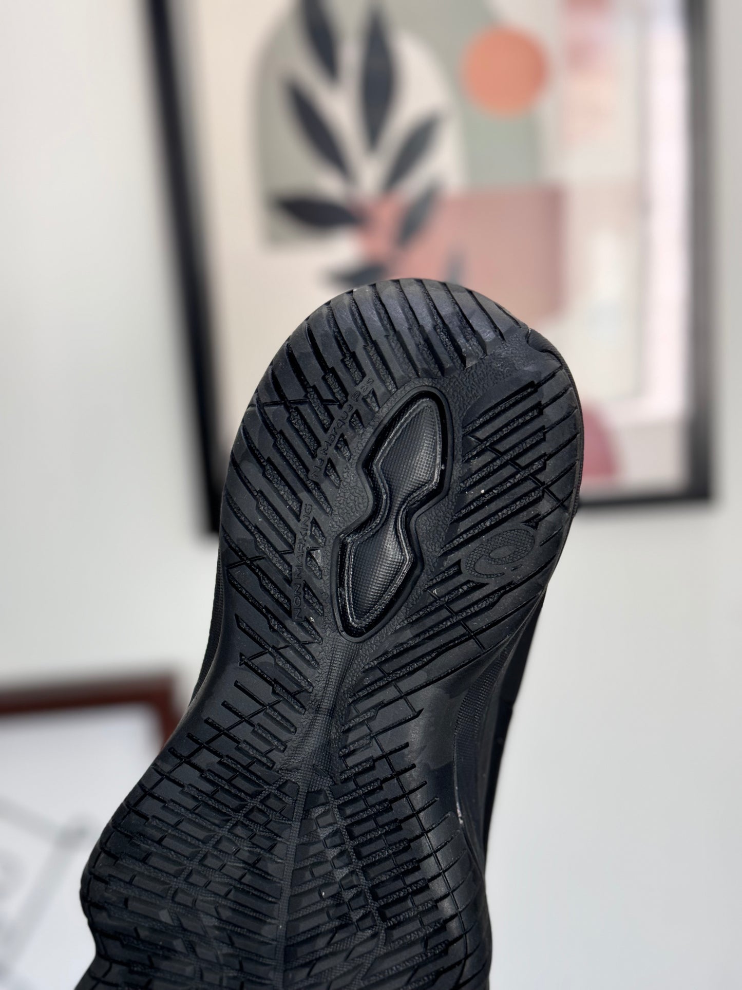 Asics Nova Surge